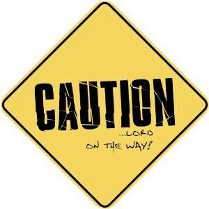   CAUTION : LORD ON THE WAY  CROSSING SIGN: Home 