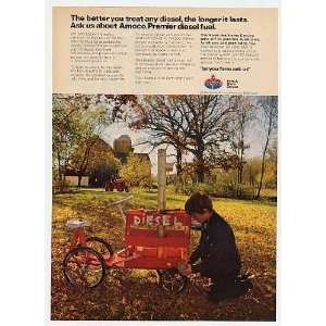   Oil Boy Diesel Tractor Riding Toy Print Ad (12667): Home & Kitchen