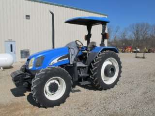 2005 NEW HOLLAND TL100A 4X4 TRACTOR WITH CANOPY, RUNS GOOD, 1300 HOURS 