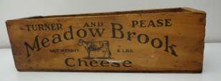   the word cheese and there is a slight split in the wood on the bottom