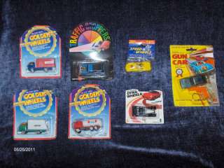 Die Cast Lot Cars and Trucks all in packages Gun Car  