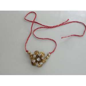   Fancy Rakhi with a Beautiful Dial ($1.50 flat rate shipping US/Canada