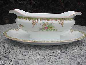 NORITAKE Japan marked with M gravy boat with foot attached  