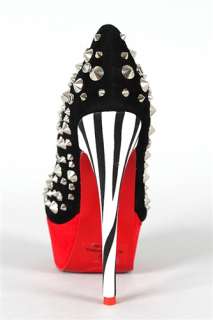 studded upper hidden platform with a red base and animal printed 