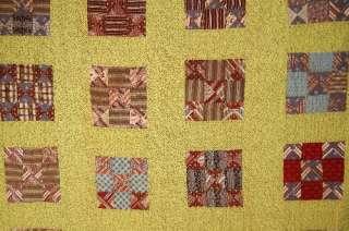   is hand pieced and hand quilted, with a nice yellow calico background