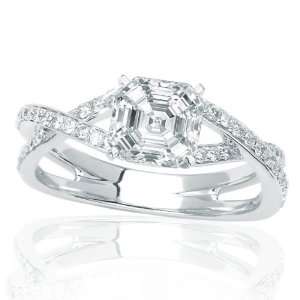 Baguette And Round Diamonds Engagement Ring with a 0.82 Carat Cushion 