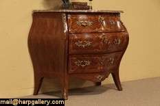 This authentic marquetry inlay commode or three drawer chest from the 