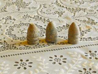 The buy it now auction is for a group of 3 Civil War era lead bullets.