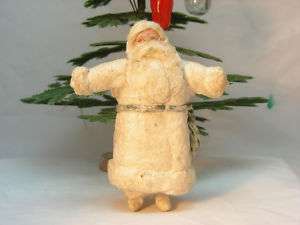Old Christmas tree decorations. Cotton figure  
