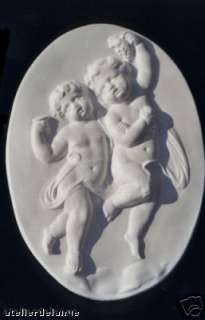   3029 30 Bas relief ovale ange 37 cms anges