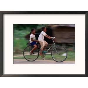  Girls Riding Bicycle in Bavel Village, Battambang, Cambodia 