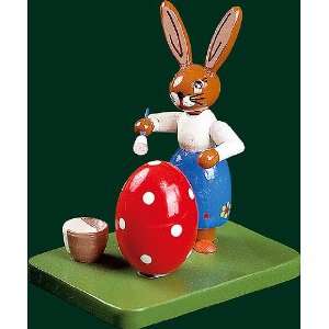    Richard Glaesser   Easter bunny busy painting egg 
