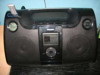 Front view of stereo system with iPod and Flash Drive in it.